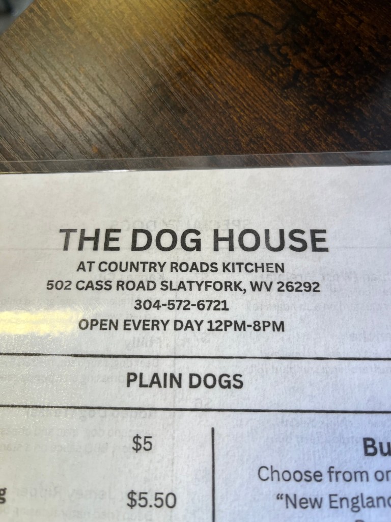 Menu page for The Dog House at Country Roads Kitchen, featuring the address, contact number, and business hours.